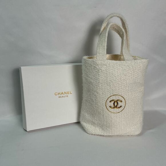 CHANEL Handbags - CHANEL Cream Textured mini Tote Bag with Gold Logo New